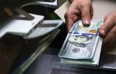 Курс доллара на Московской бирже упал ниже 50 рублей