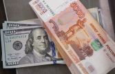 Курс доллара на открытии торгов Московской биржи снизился на 12 копеек до 62,15 рубля
